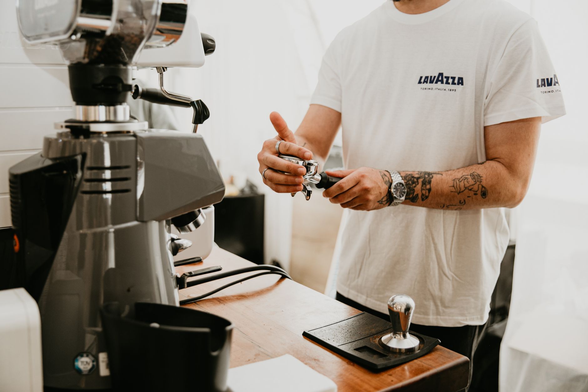 coffee maker with built-in grinder on kitchen counter
