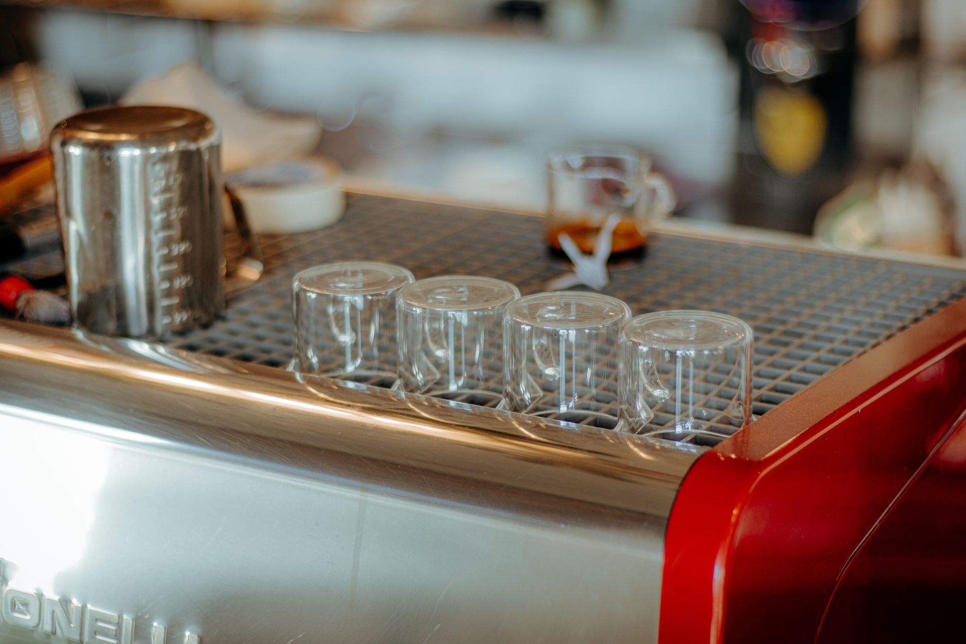 espresso shot golden crema in white demitasse cup