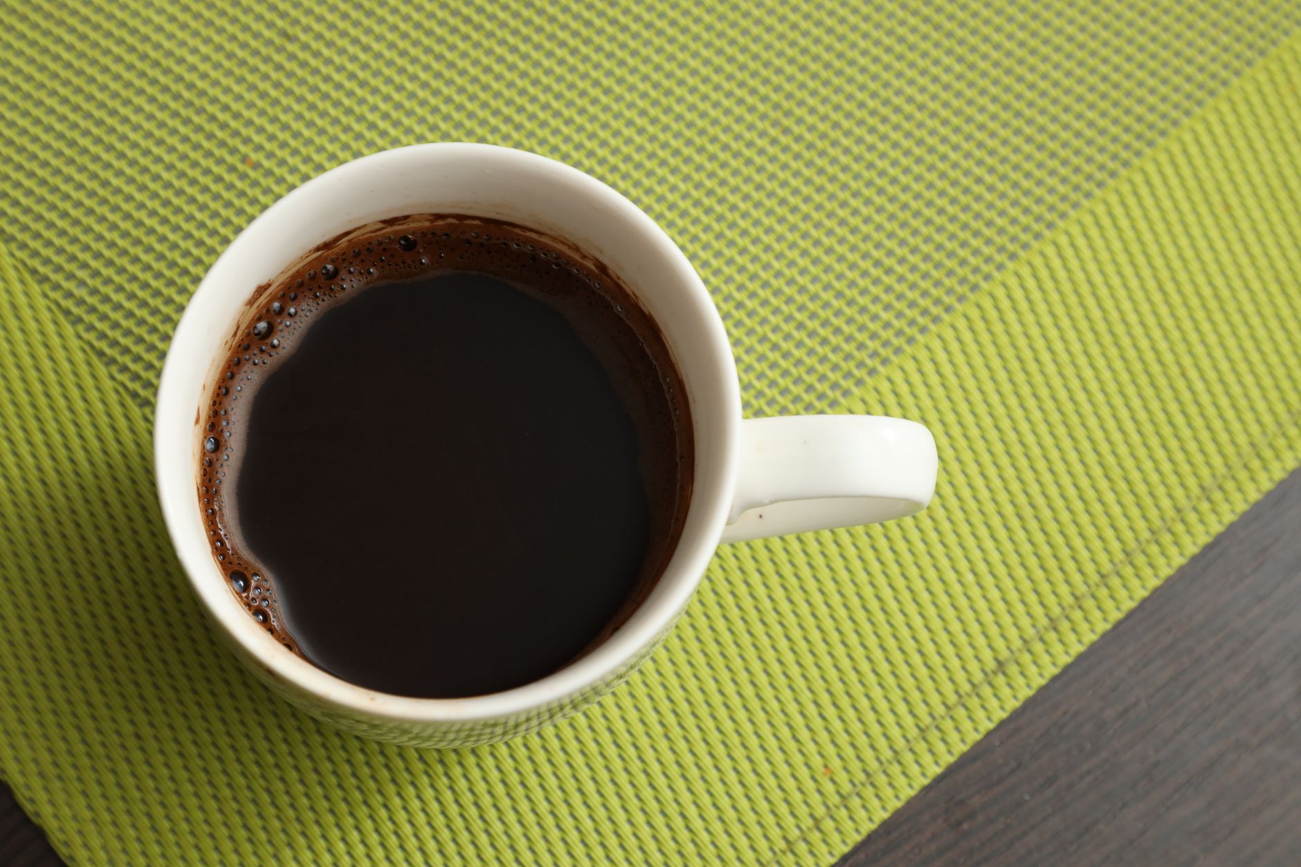 espresso shot golden crema demitasse cup close up