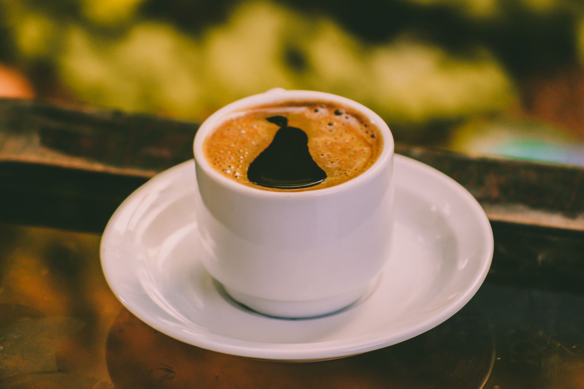 espresso shot golden crema demitasse cup close-up