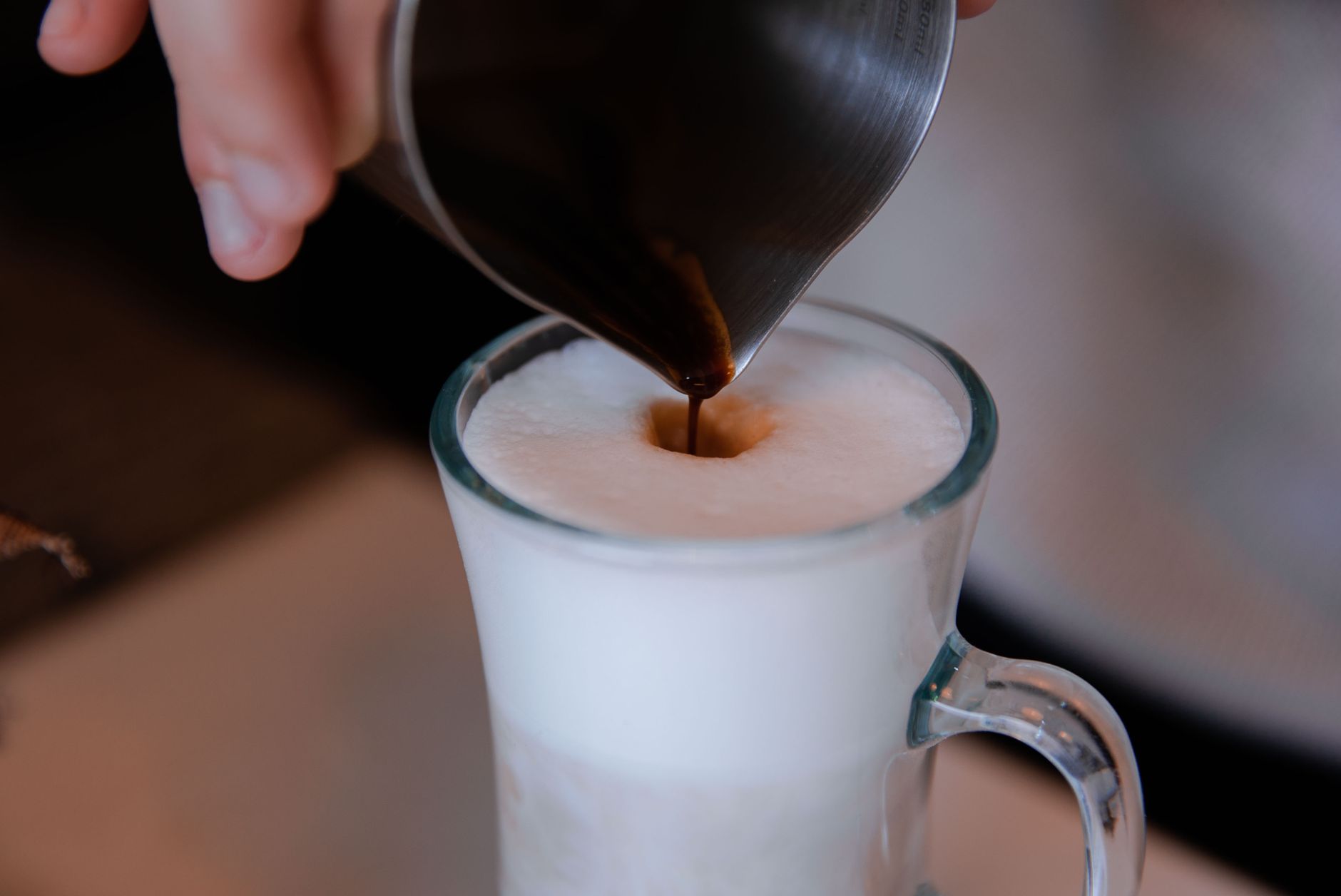 iced latte espresso over milk ice glass
