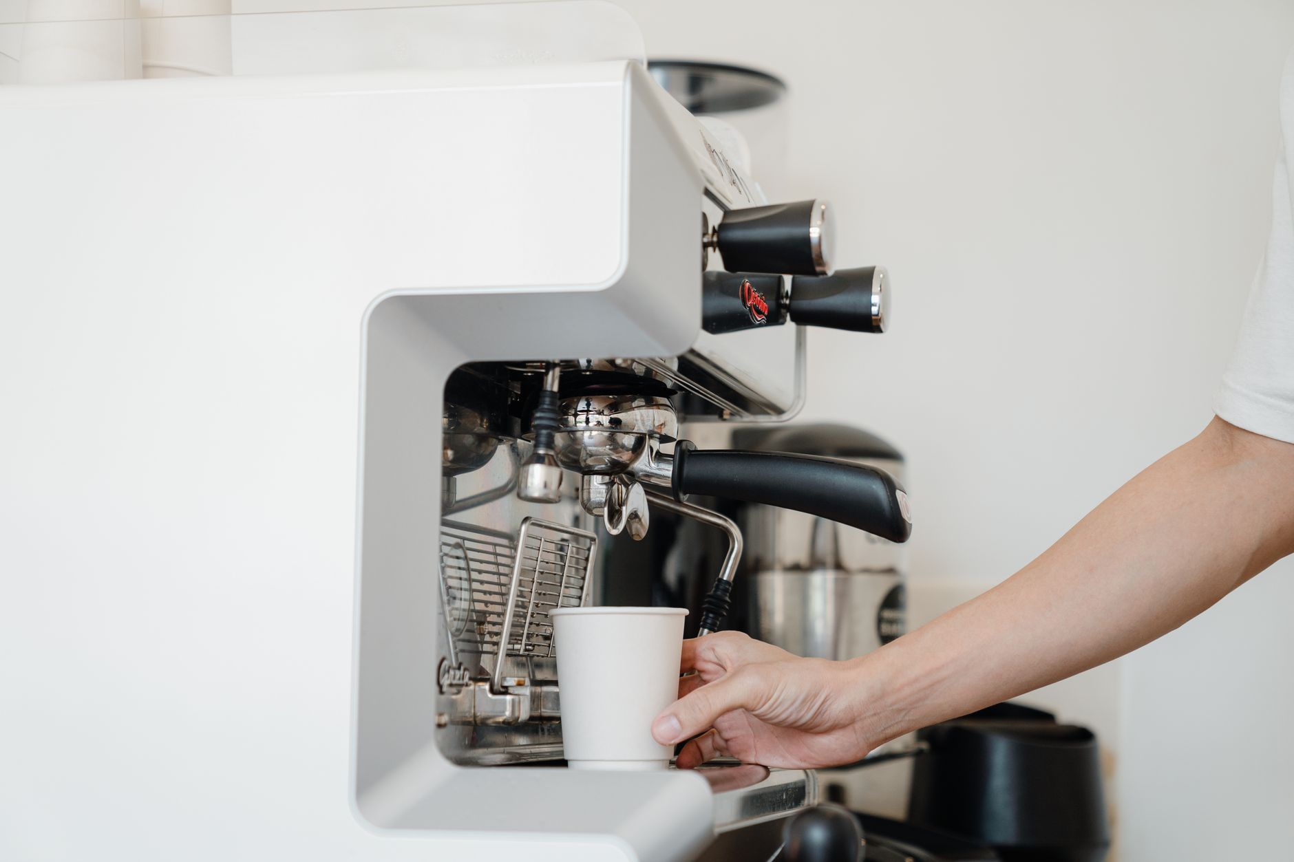 espresso machine integrated grinder hopper closeup