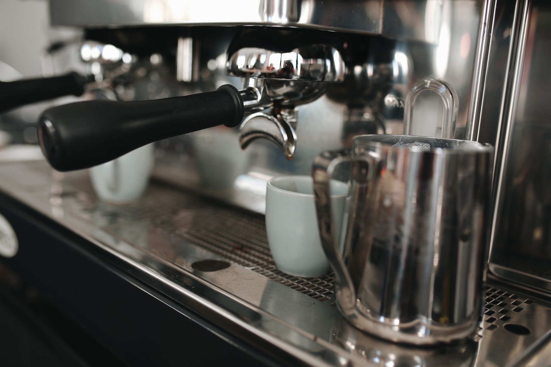 espresso shot pulling into rocks glass close-up